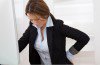 Businesswoman With Back Pain